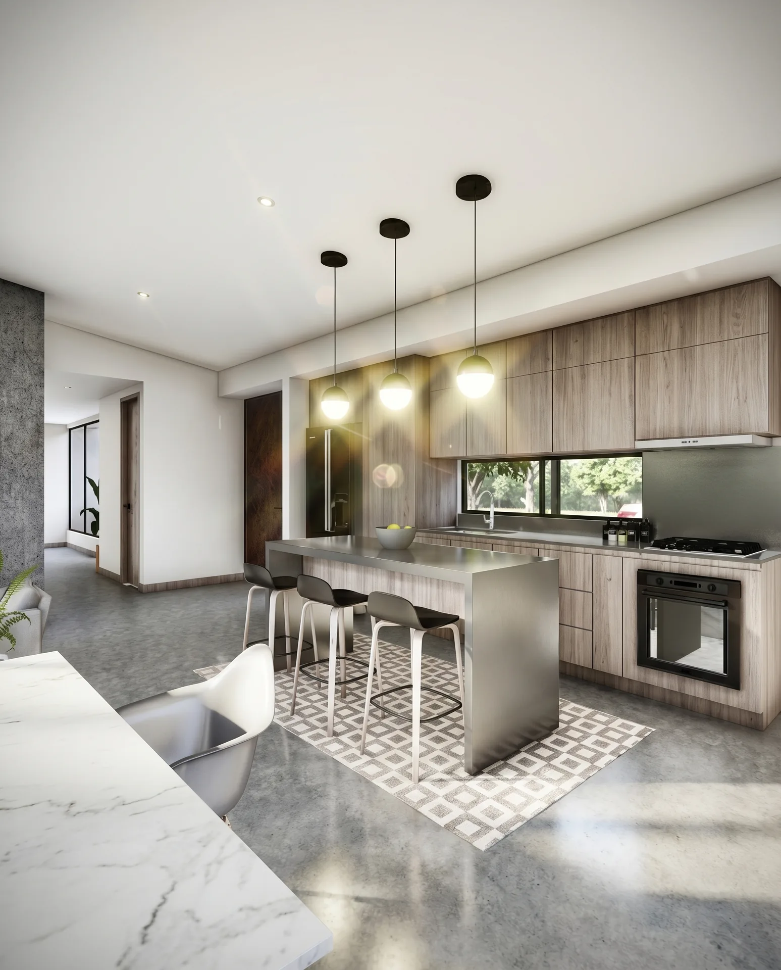Cocina moderna con isla central y electrodomesticos de acero inoxidable